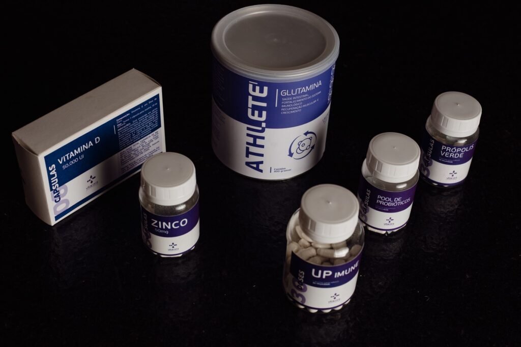 Close-up of a variety of nutritional supplements, vitamins, and probiotics.